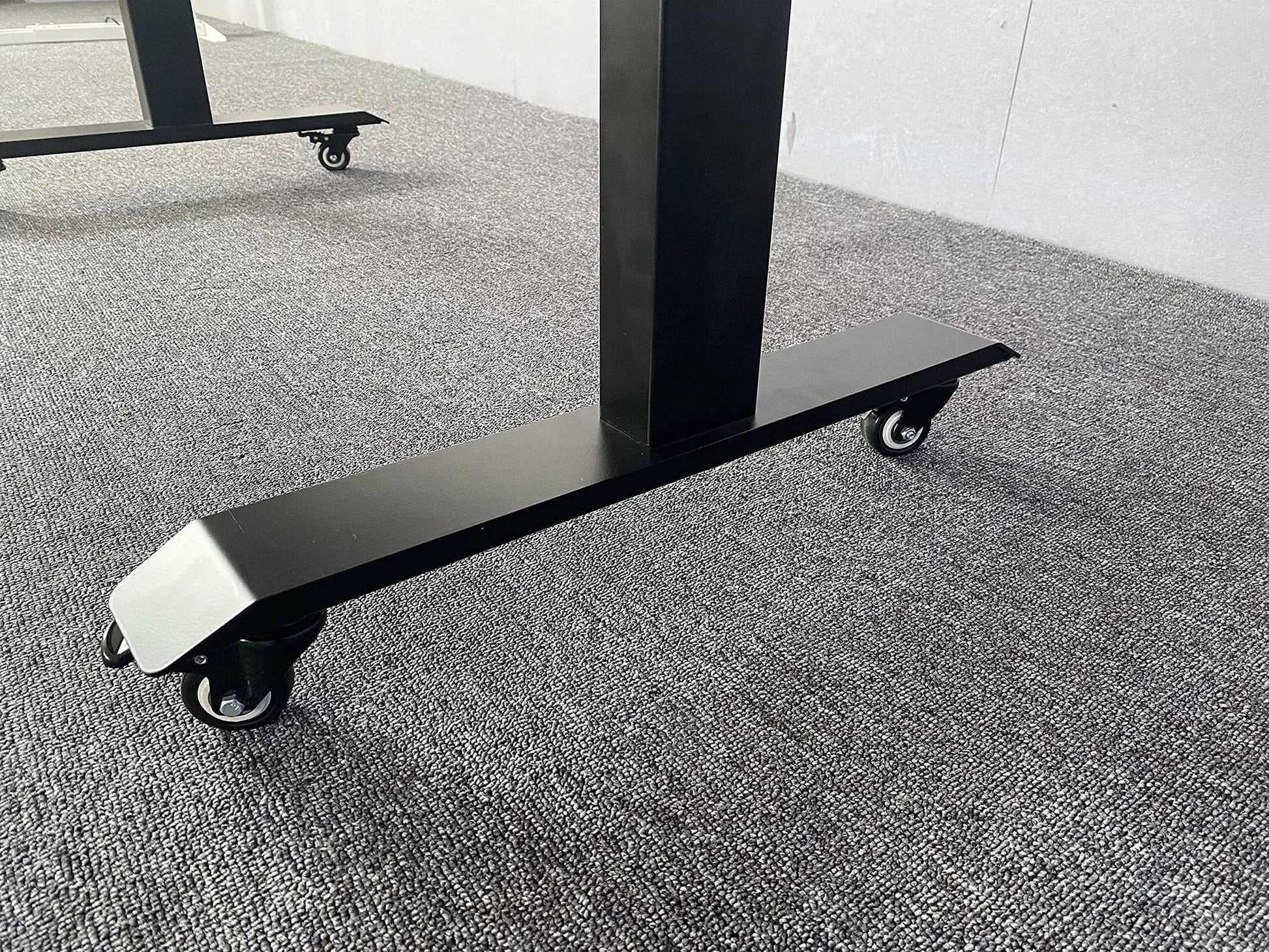 Standing desk base with 2 Inch M8 Threaded PU Swivel Casters Set Of 4 With Brakes for mobility on a carpeted floor