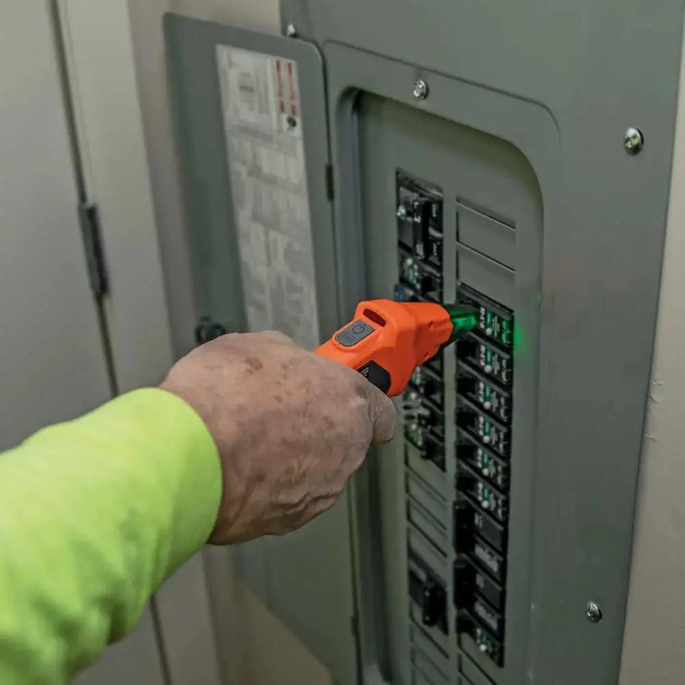 ET310KIT AC Circuit Breaker Finder Kit With Transmitter And Receiver in use on electrical panel for breaker identification.