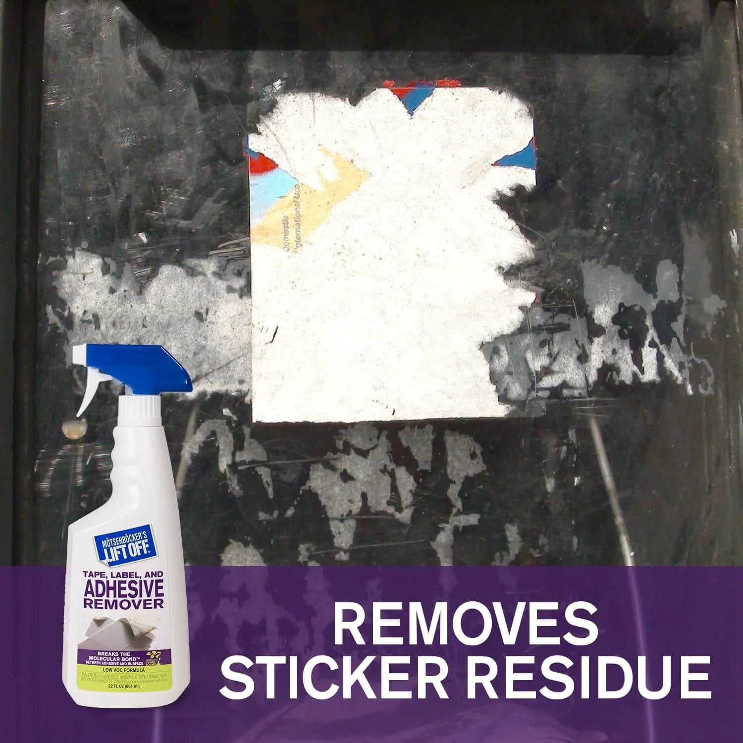 Motsenbocker's Lift Off 40701 Tape, Label, and Adhesive Remover bottle next to removed sticker residue on glass surface.