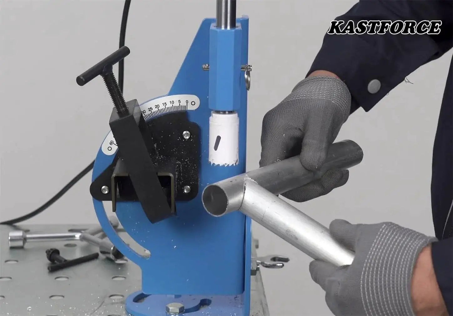 2 Inch Hole Saw Pipe Tube Notcher With Adjustable Tilt From 0 To 60 Degrees being used on metal tubing