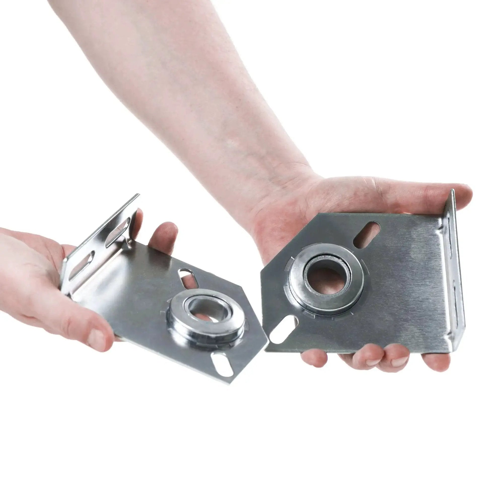 Hands holding Spring Center Bearing Bracket For Torsion Doors 3 3/8 Inch, galvanized steel, garage door parts