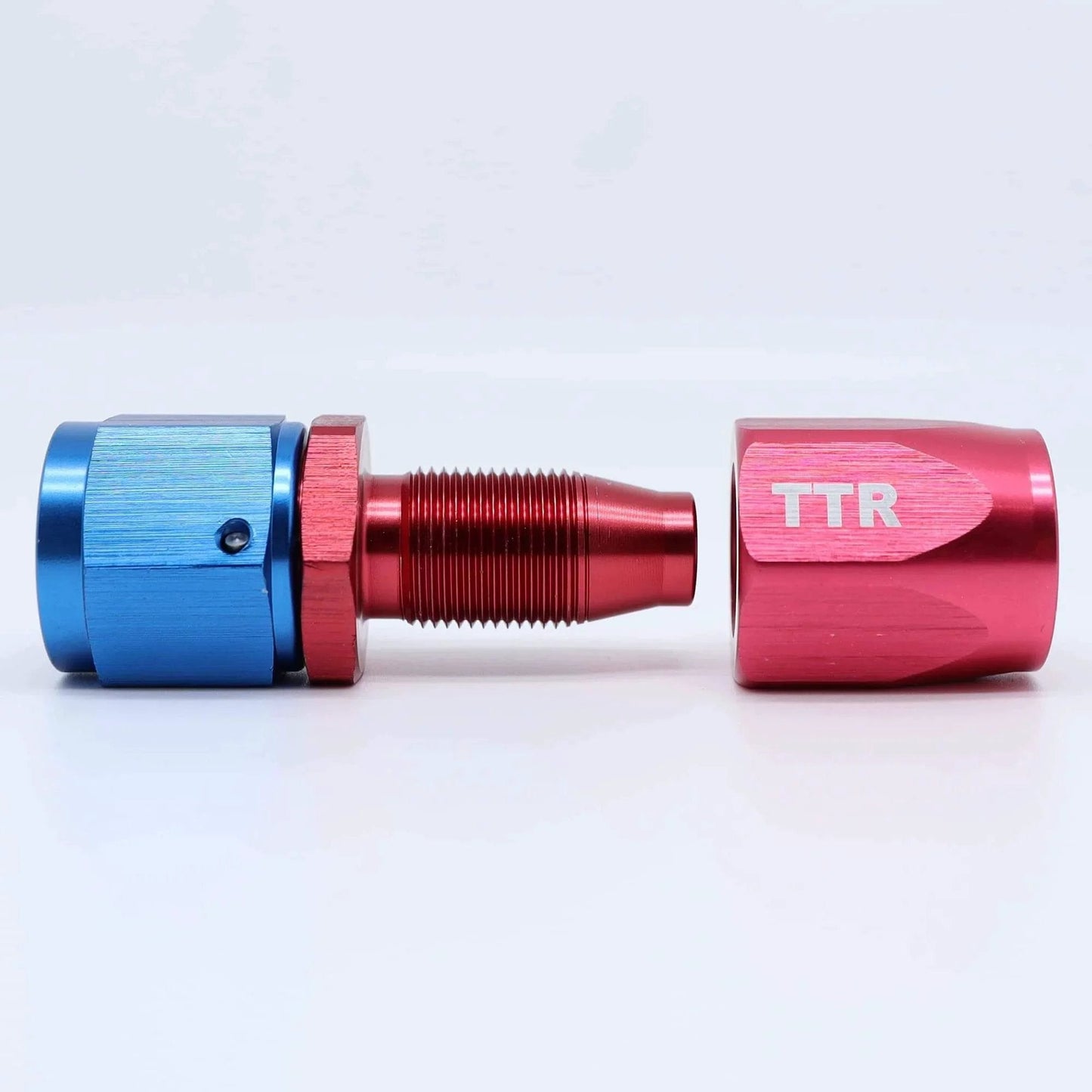 Red and blue swivel fitting from Three Eighth Inch Stainless Steel Braided Fuel Line Hose E85 Compatible Kit 30 Feet Black