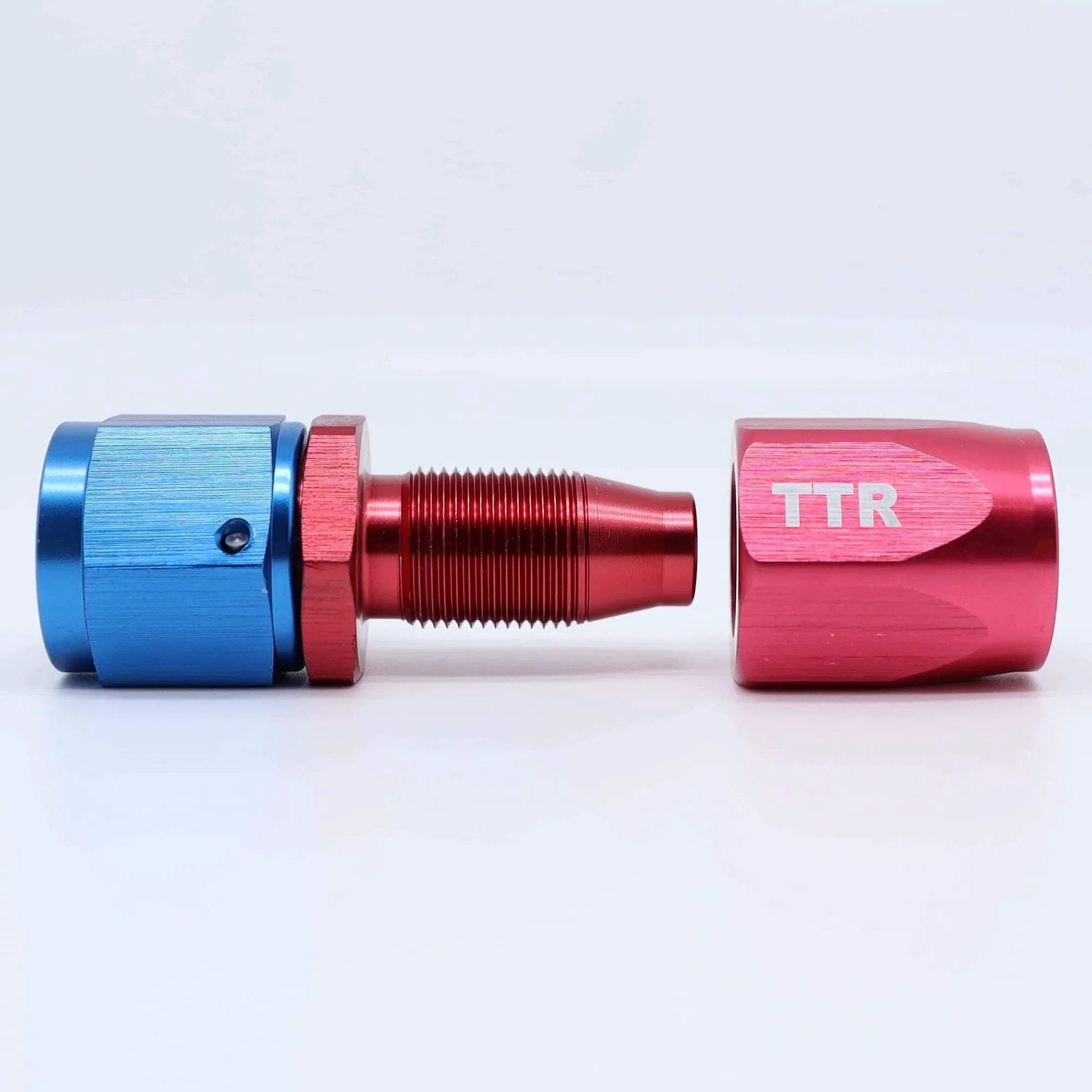Red and blue swivel fitting from Three Eighth Inch Stainless Steel Braided Fuel Line Hose E85 Compatible Kit 30 Feet Black