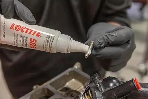 Applying Automotive White Thread Sealant With High Viscosity And Rapid Cure That Replaces Tapes And Pipe Dopes OEM Approved