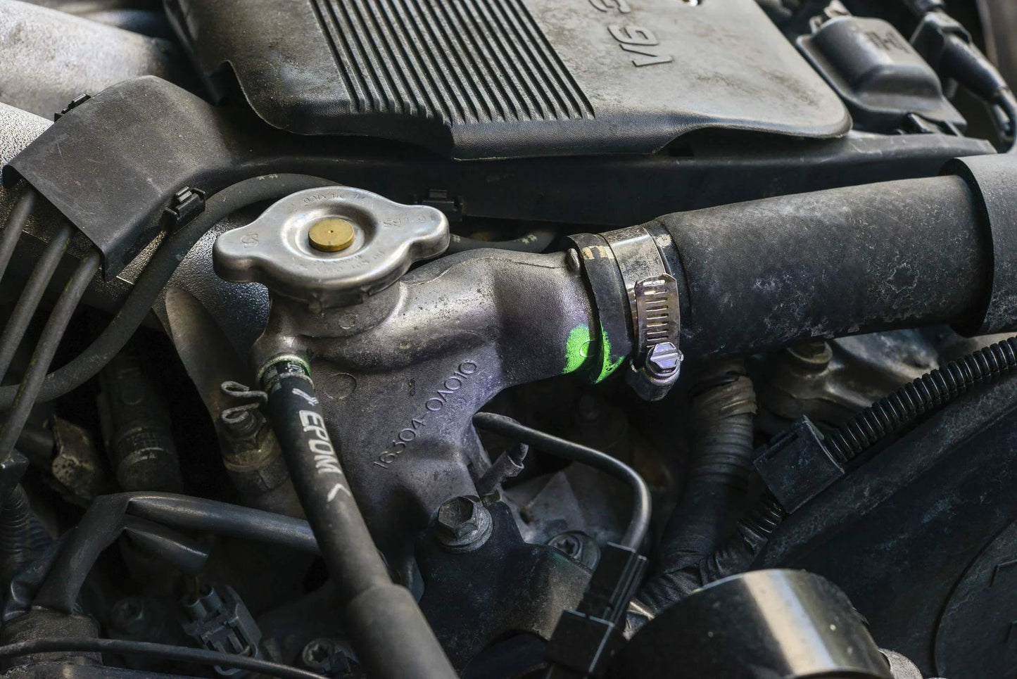 Installed Bright Ultraviolet Automotive Leak Detection Dye For Radiators Hoses Heater Cores And Water Pumps 1Oz Fluorescent Dye on engine.