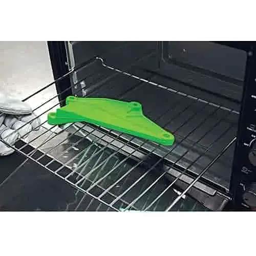 Bench Top Powder Coating Oven 1600 Watt 120 Volt With 450 Degree Capacity showing green part on rack