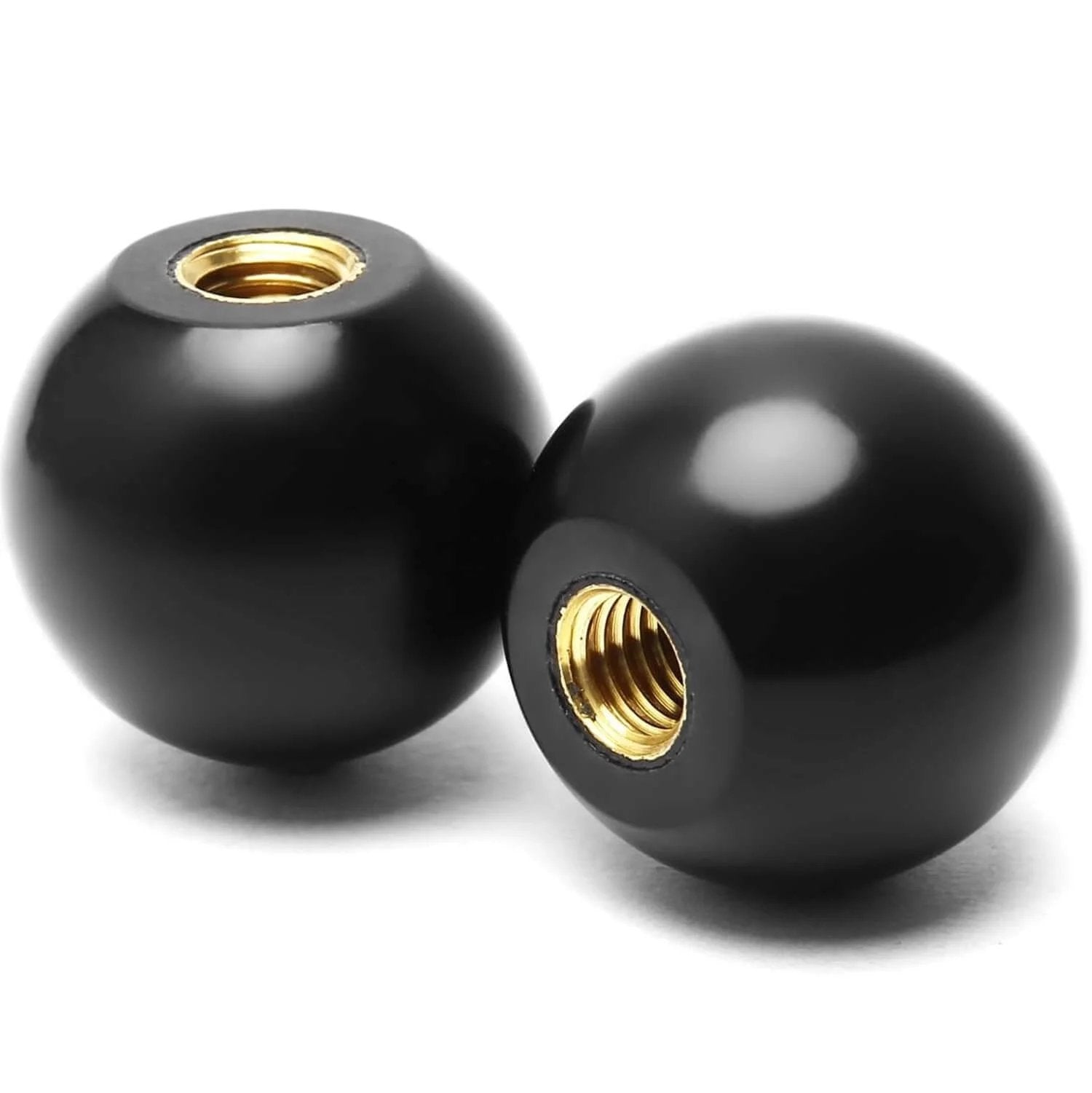 Close-up of black Bakelite knobs with 3/8-16 threads, part of Five Pack 3/8-16 Threaded Ball Knobs For Lawn Mowers 1-3/8 Inch Diameter Bakelite Thermoset Handle Black