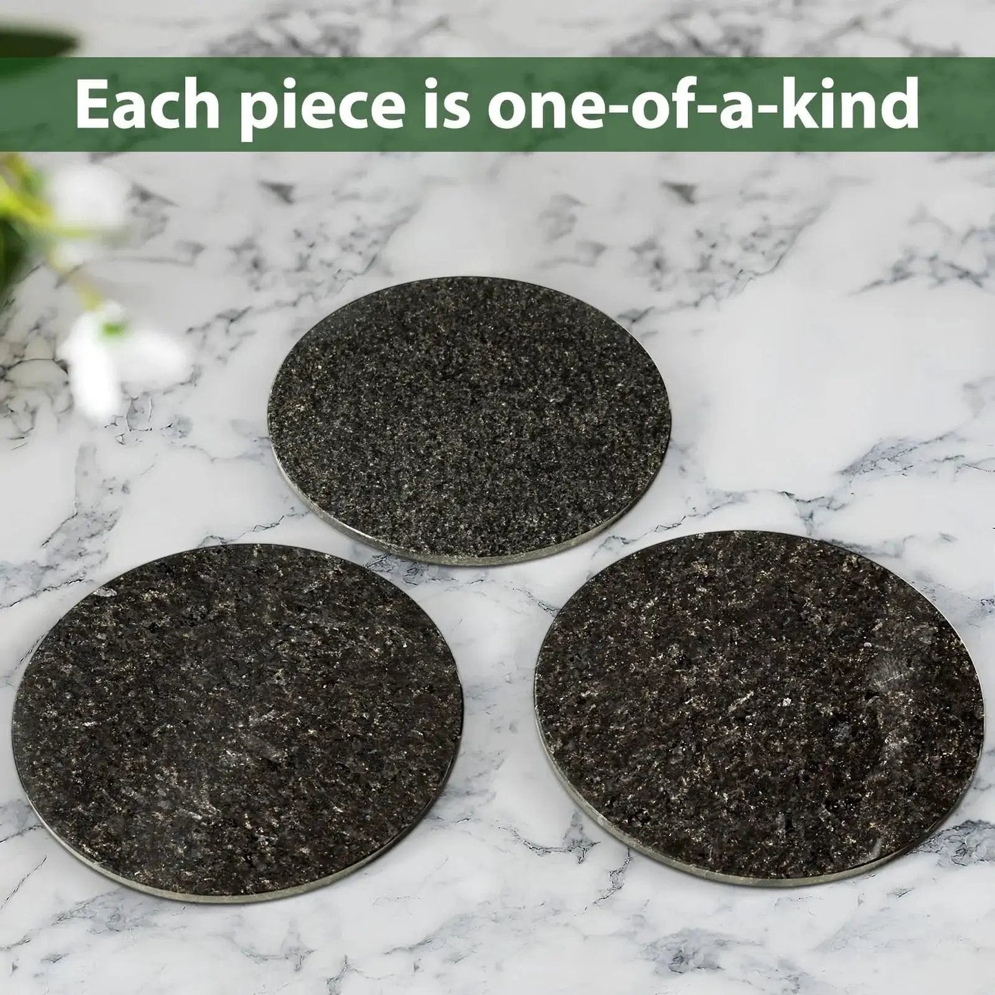 Three black marble discs on marble surface, illustrating material of Marble 16 Inch Lazy Susan Turntable Organizer For Cabinets Pantries Kitchen Counters Fridge And Vanity With Silent Smooth Rotation Anti Slip Rubber Feet And Durable Aluminum Bearing For Easy 360 Degree Access Black.