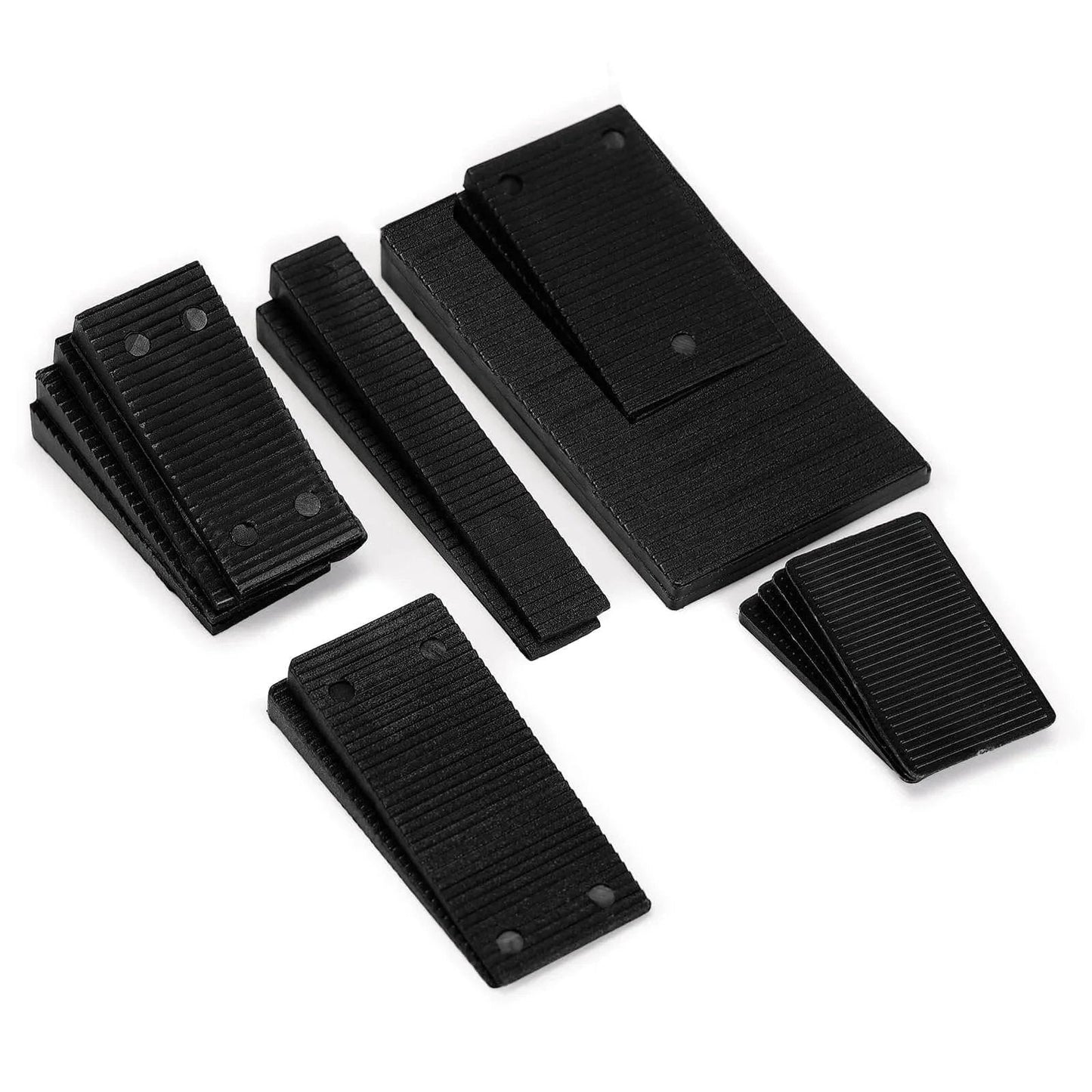 16 Pack Multiple Size Slopes Black Plastic Composite Shims Leveling Wedges For Furniture Displayed on White Surface