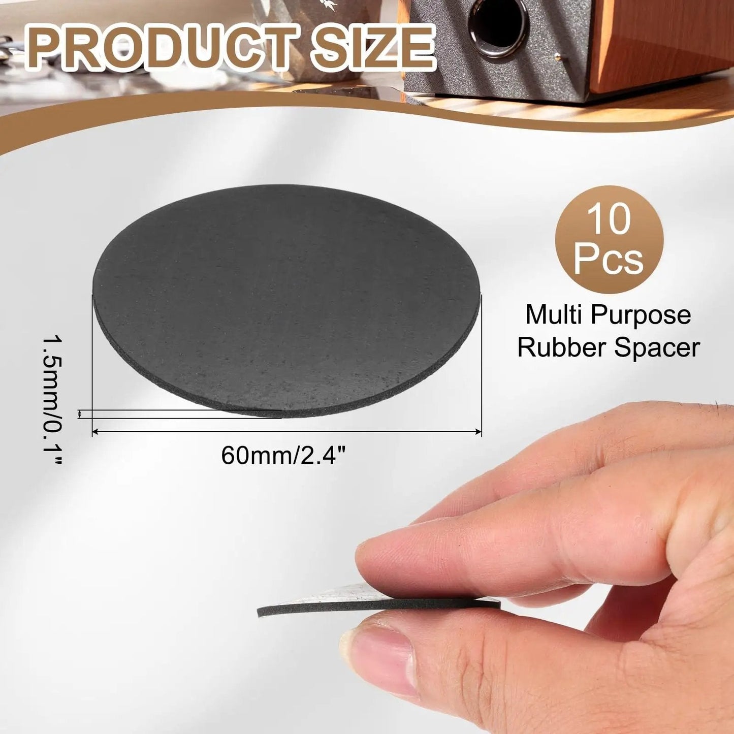 Close-up of a hand holding a black rubber spacer washer, 60mm diameter and 1.5mm thick, part of a 10-pack set for DIY use.