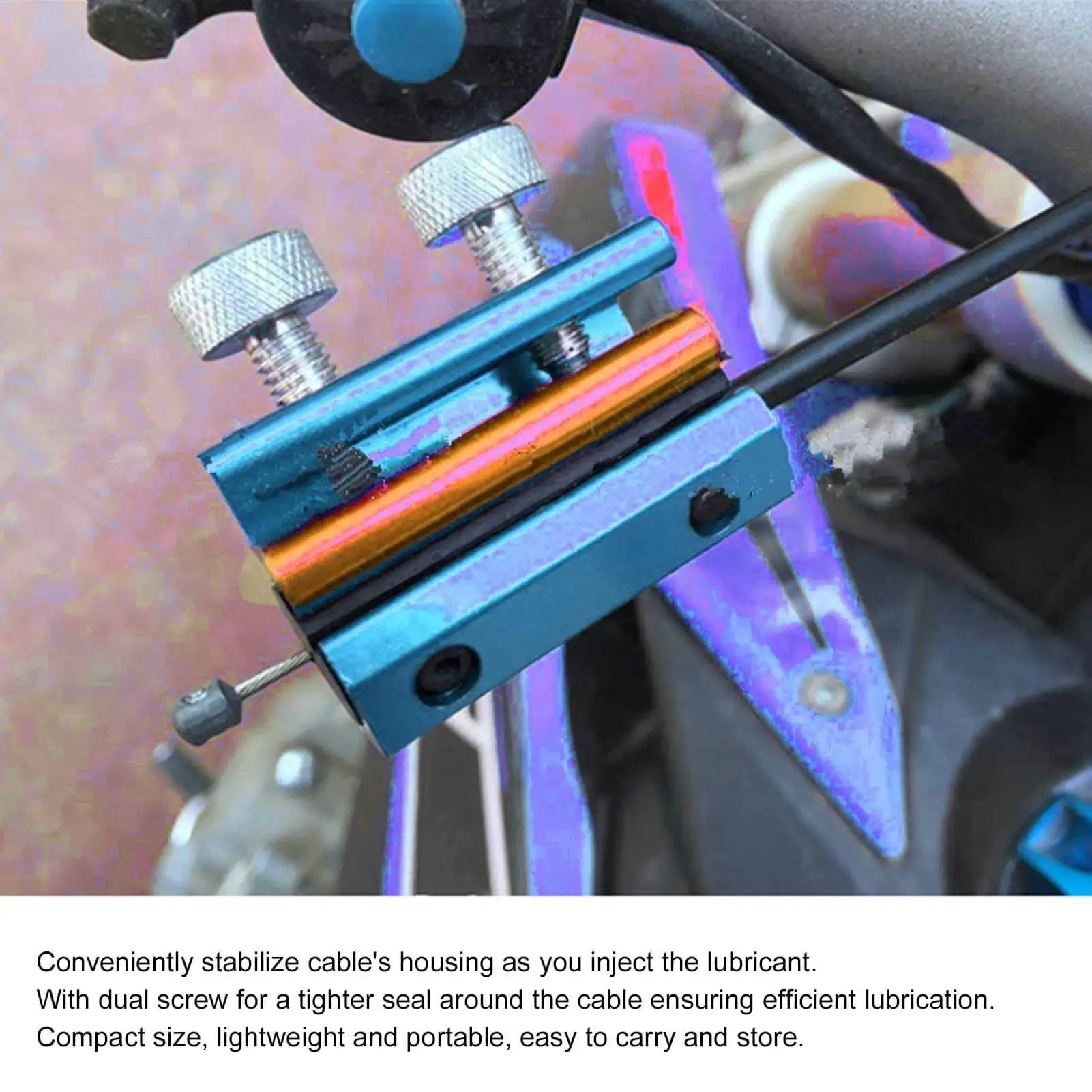 Aluminum Portable Motorcycle Cable Lubrication Tool for Brake Throttle and Clutch Cables on ATVs installed on a motorcycle.
