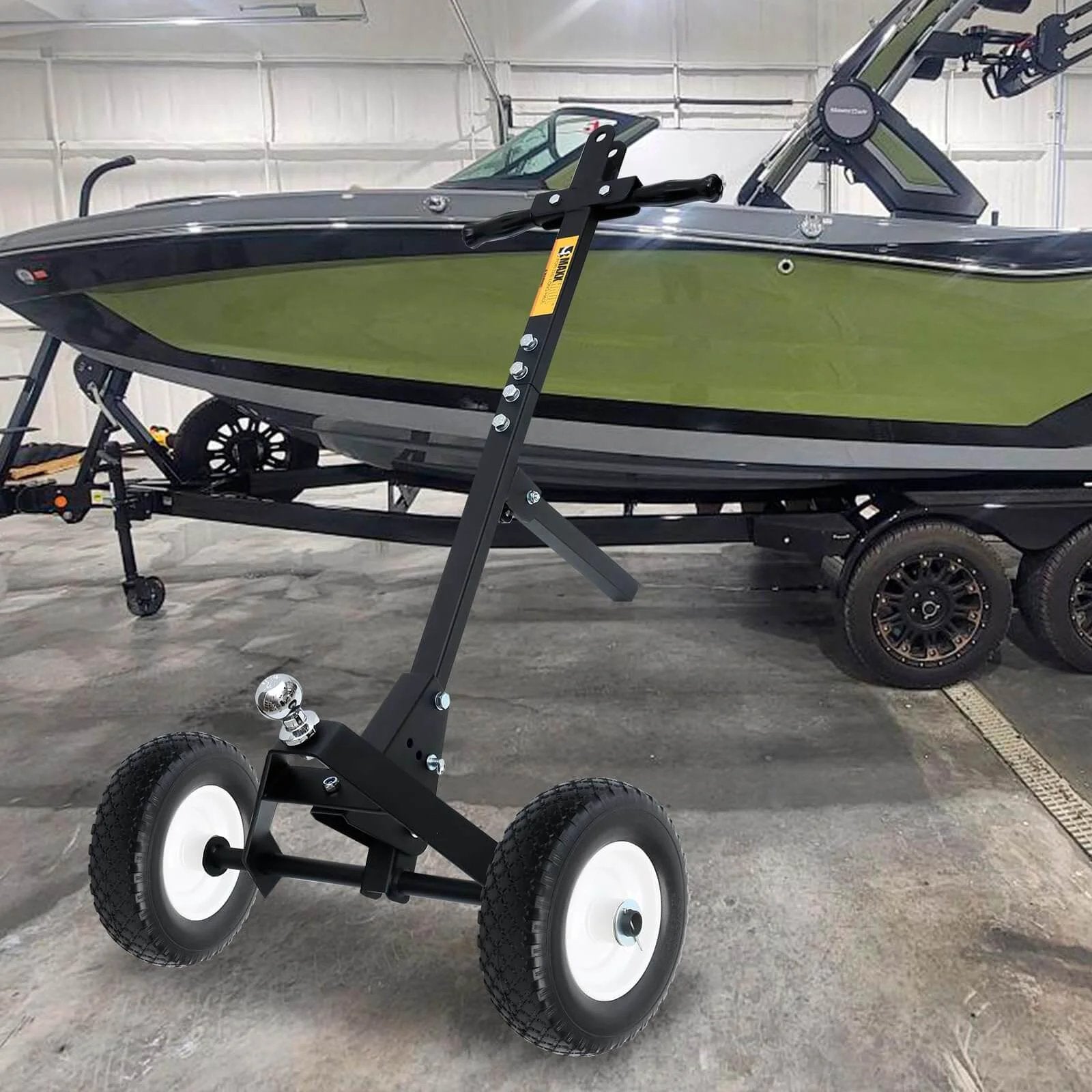 12 Inch Flat Free Solid Polyurethane Tire and Wheel on trailer dolly next to boat, black all-purpose replacement with 1 inch bore