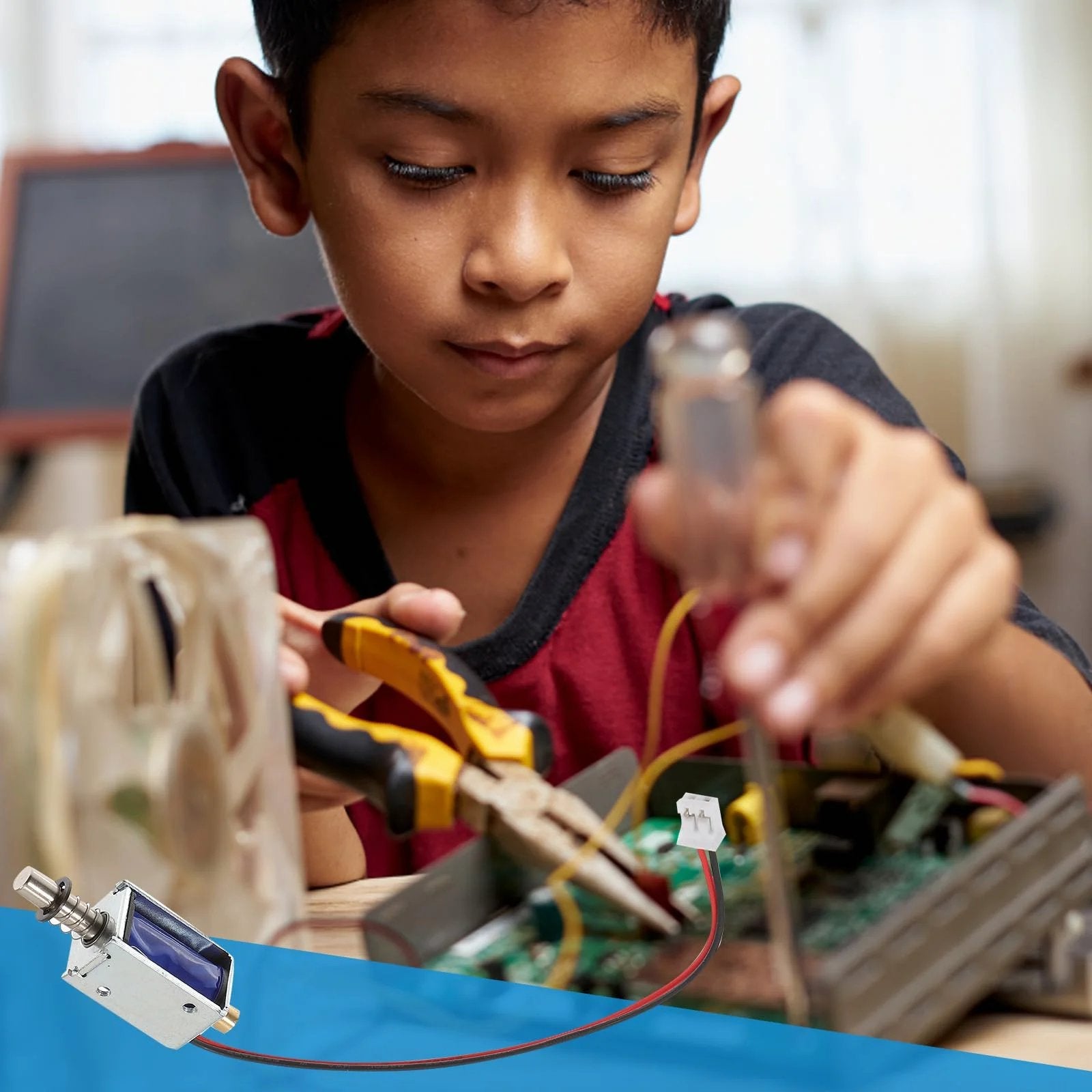 Boy working on electronics with Mini Push Pull 12V Solenoid Electromagnet Open Frame Linear Actuator for Vending Machines and Industrial Projects with Plunger Spring Return visible.