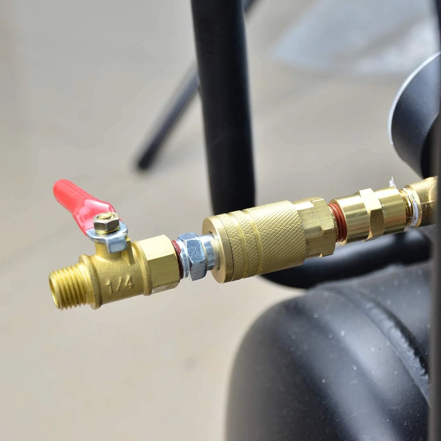 Durable Brass 1/4 Inch Quick Connect Air Coupler Set, Two Pieces With 1/4 Inch NPT Male Threads, Industrial Grade, Corrosion Resistant, Long Lasting, Interchangeable With Most Brands, Yellow Finish by GASHER connected to air hose with valve.
