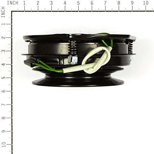 Side view of Briggs and Stratton 5023233SM Electric Clutch, showing wires and size against a measuring grid.