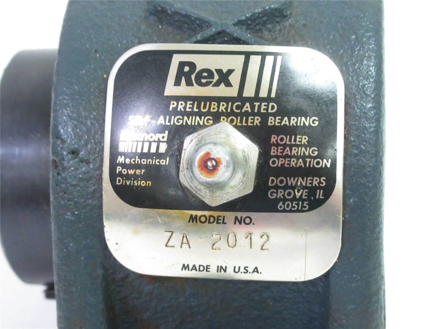 Label on rugged cast iron spherical roller pillow block bearing with two bolt mount and set screw locking collar clearance seal.
