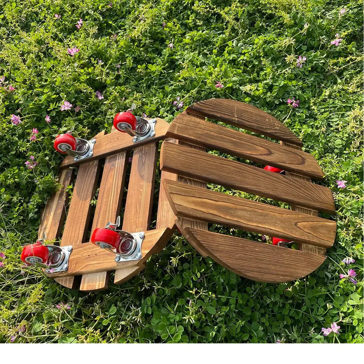 Wooden platforms with Heavy Duty 1.5 Inch Caster Wheels Set Of 12 With Brakes, Swivel Locking Casters, Red PVC Wheels on green grass