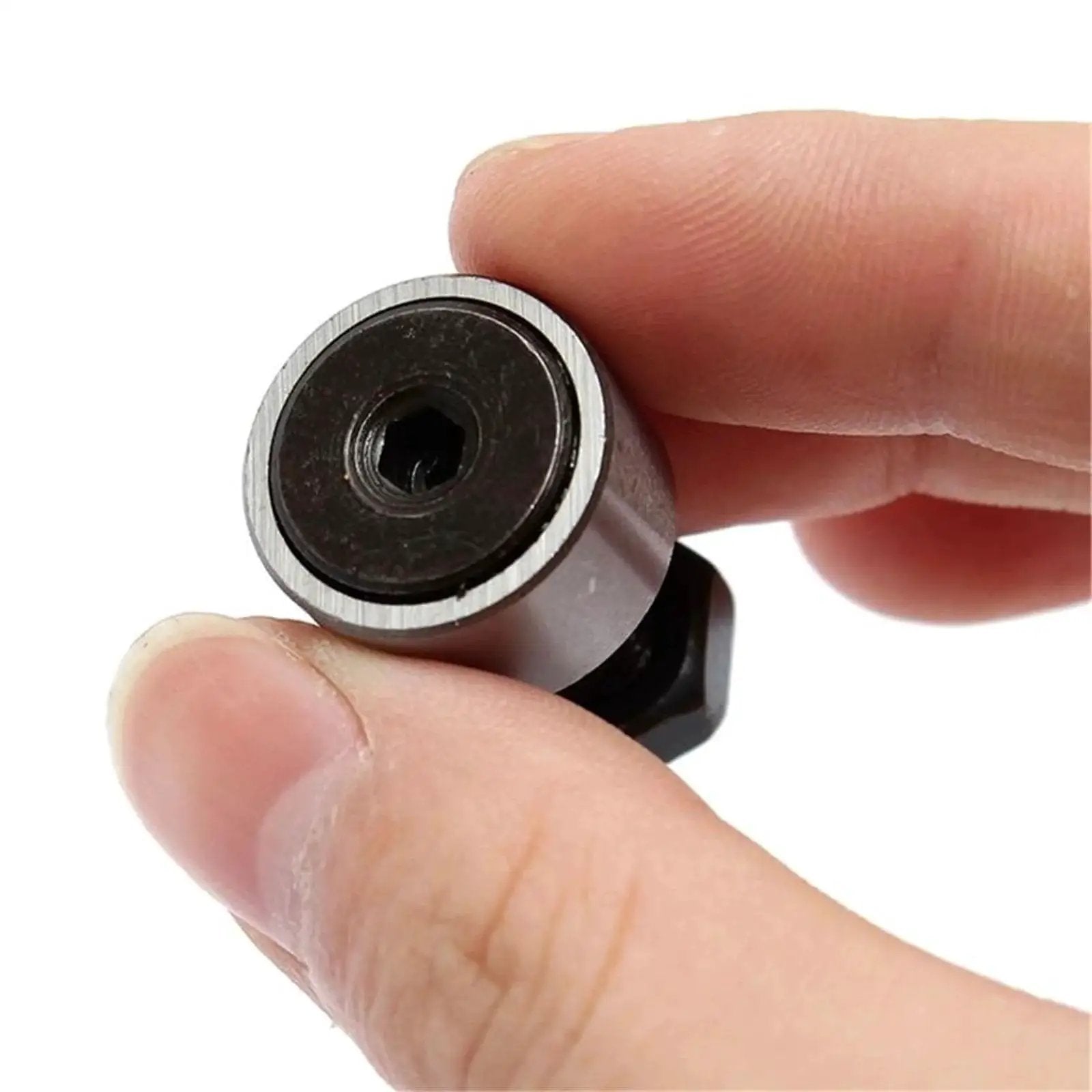 Close-up of 2pcs CF8 KR19 Cam Follower Needle Roller Bearing With M8x1.25mm Male Thread, 19mm Roller Diameter, held between fingers