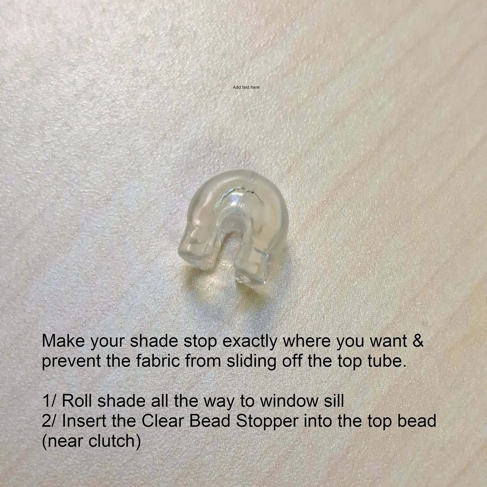 Clear bead stopper for shades on wooden surface