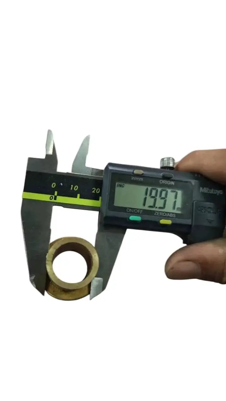 Measuring clutch sleeve from Bike Engine Clutch Bell Drum Brushing Sleeve Kit For 100cc 4 Stroke Motors with caliper; brass material