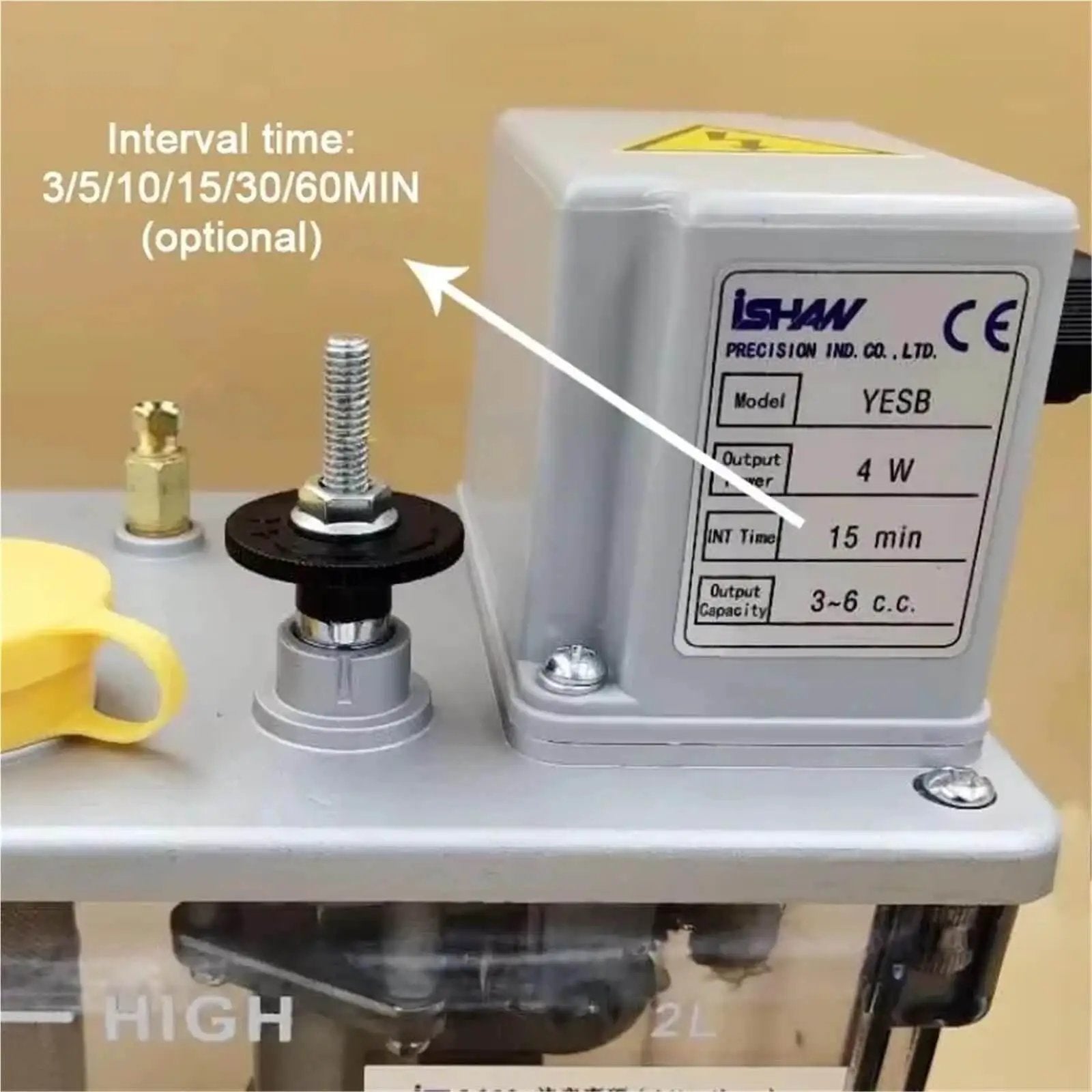Close-up of Pro Grade Electric Intermittent Lubrication Pump for CNC machine tools showing interval settings and specifications.
