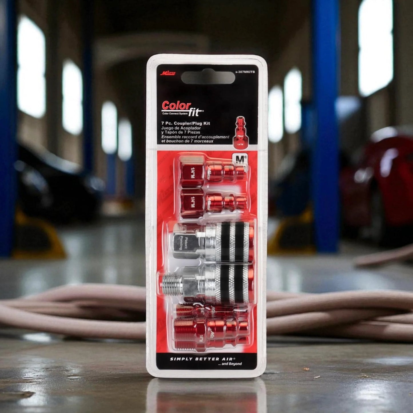 Colorfit M Style Coupler And Plug Kit With Rubber Bumpers For One Quarter Inch NPT Quick Connect Hose Fittings For Air Tools And Compressors, displayed on a packaging with red and grey components.