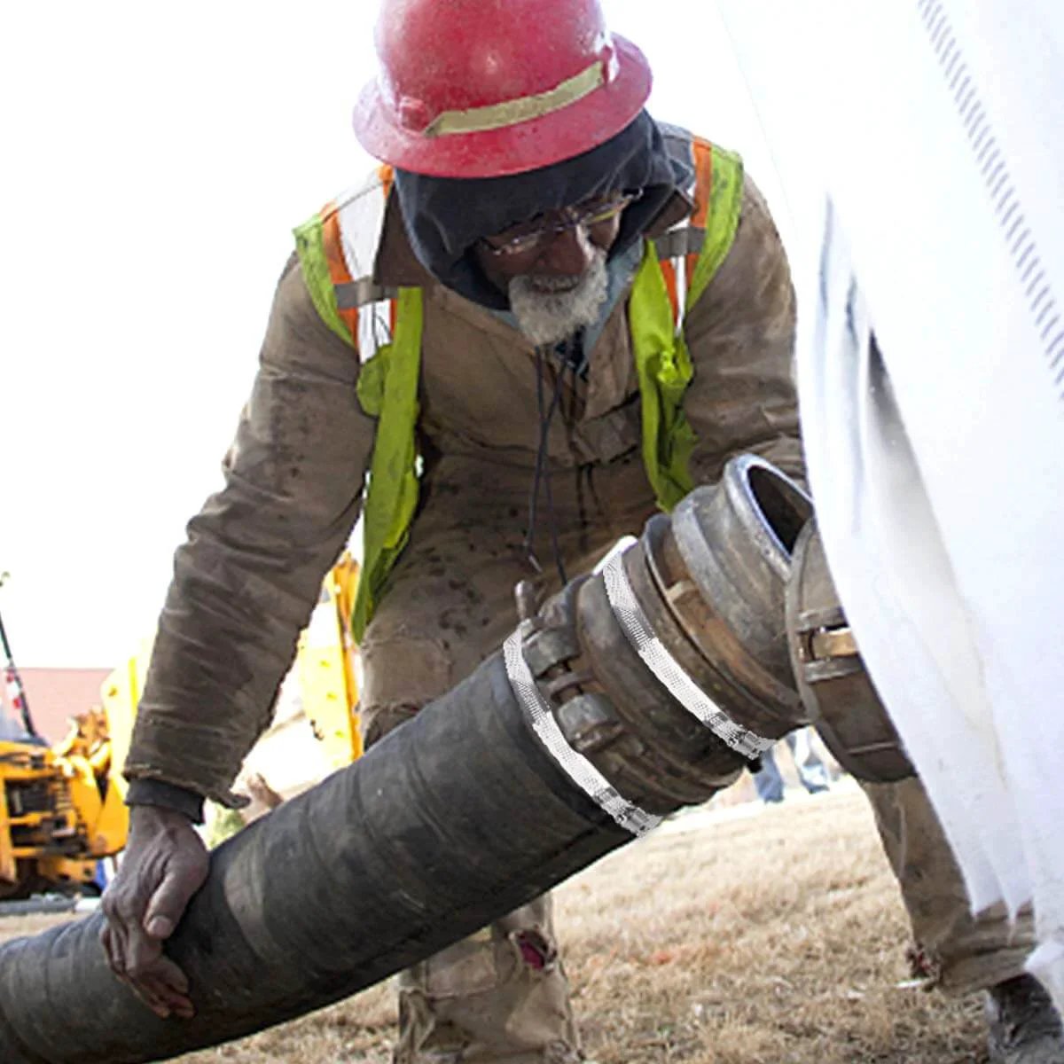 Worker installing a hose with 10 Pack 3 Inch Stainless Steel Hose Clamps Worm Gear Duct Clamps Adjustable From 3 Inch To 3 Point 5 Inch 75 To 90mm Premium 304 Stainless Steel Durable Rust Resistant For Dryer Vent Hose And Fuel Line.