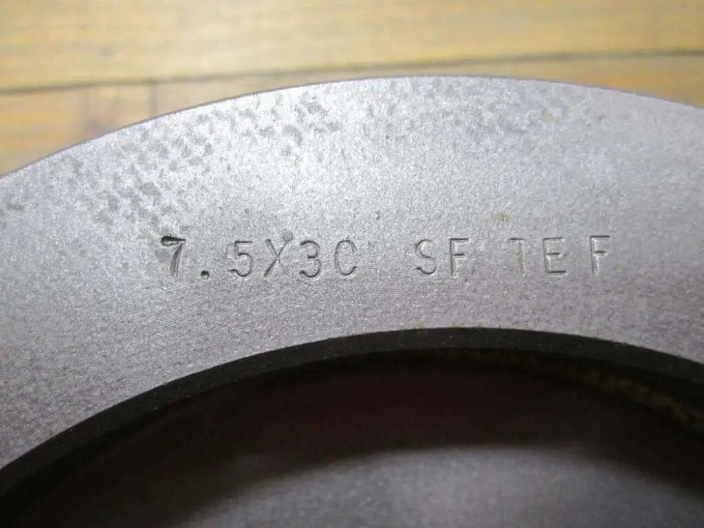 Close-up of a TB Wood's 753C style Conveyor Sheave 7.5X3C SF For Classical CB Bushing with through bore, showing part number engraving.