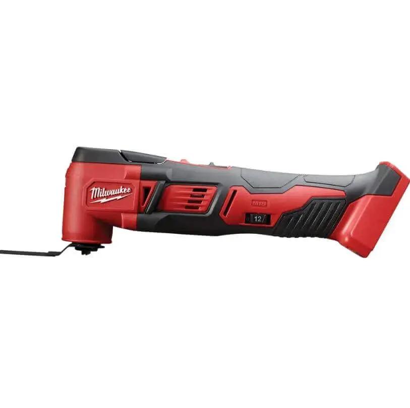 Side view of Milwaukee M18 18V Cordless Orbiting Multi Tool with 12 speed settings, showing durable all-metal gear case and cutting blade attachment.