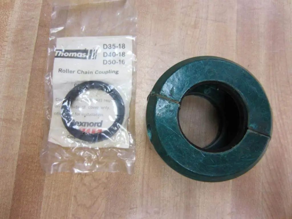 D35 18 RC Hub 1 Inch Bore New Rexnord Industrial Hub for power transmission and conveyor systems, shown next to packaging.