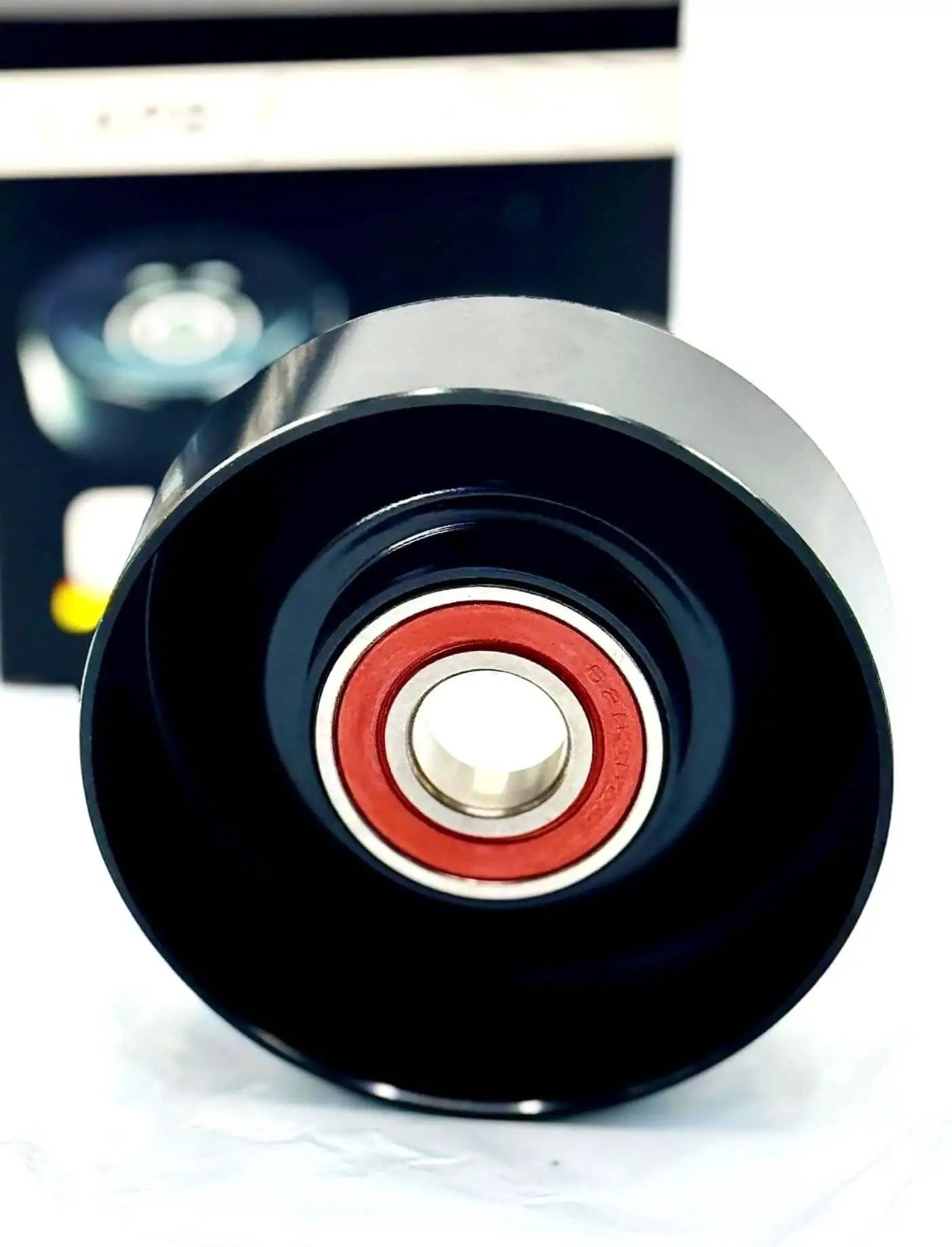 Drive Belt Idler Pulley And Tensioner Pulley 38001 OEM Interchange 88909582 with red NSK bearing front view
