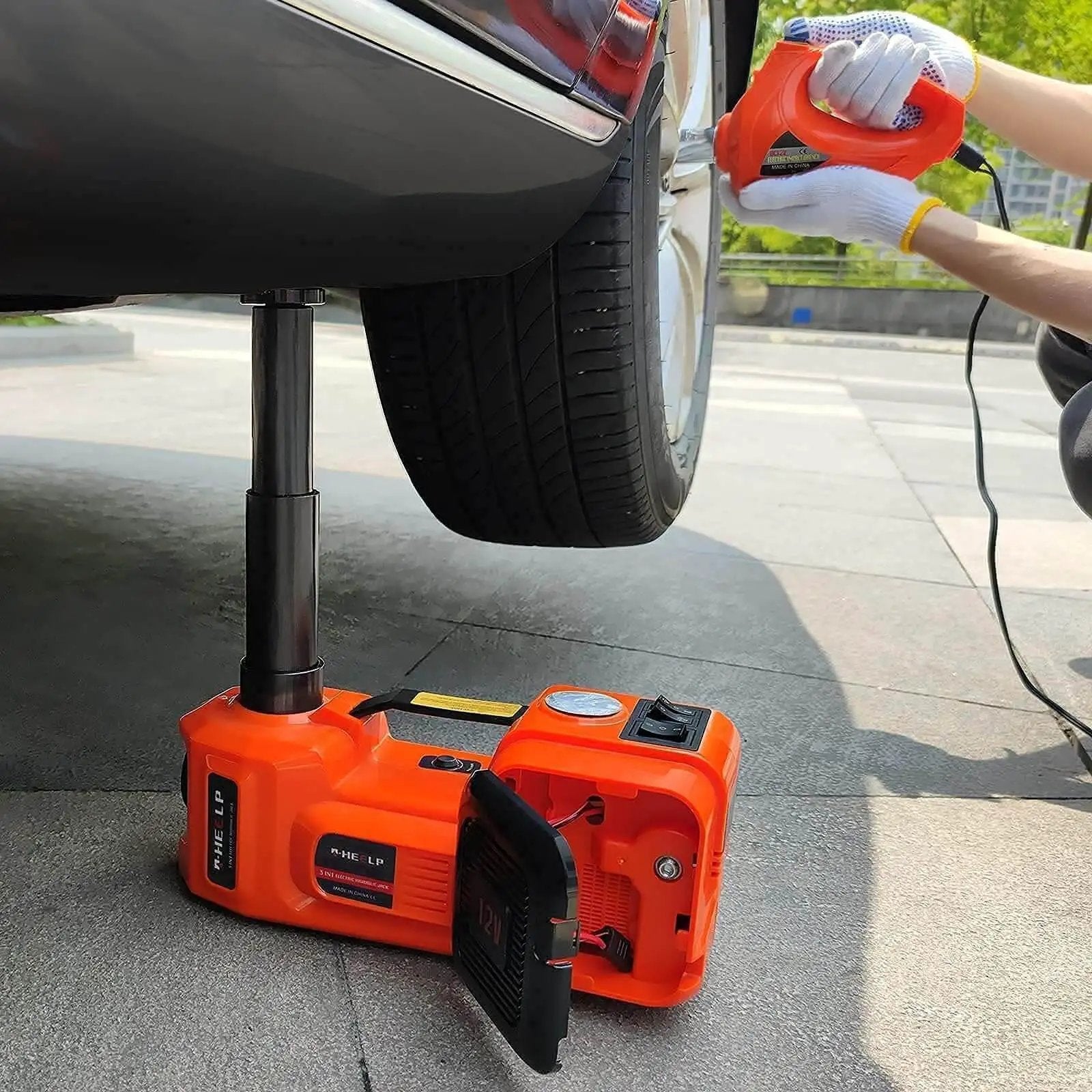 Fast 5-Ton Electric Car Jack Kit With 12V Hydraulic Lift And Impact Wrench For SUV MPV Sedan And Truck, lifting a car