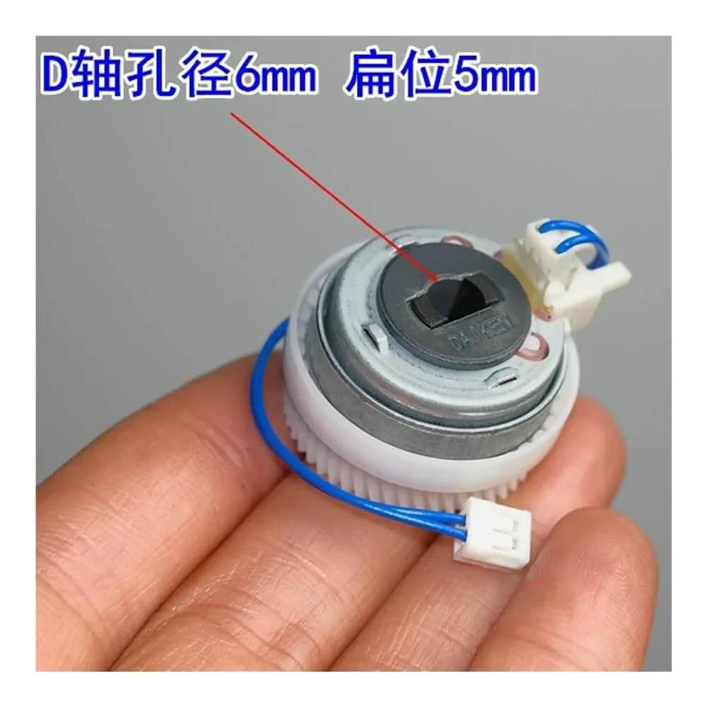 Electromagnetic Clutch DC 24V High Torque Clutch for 6mm D-Shaft held in hand showing size and connector