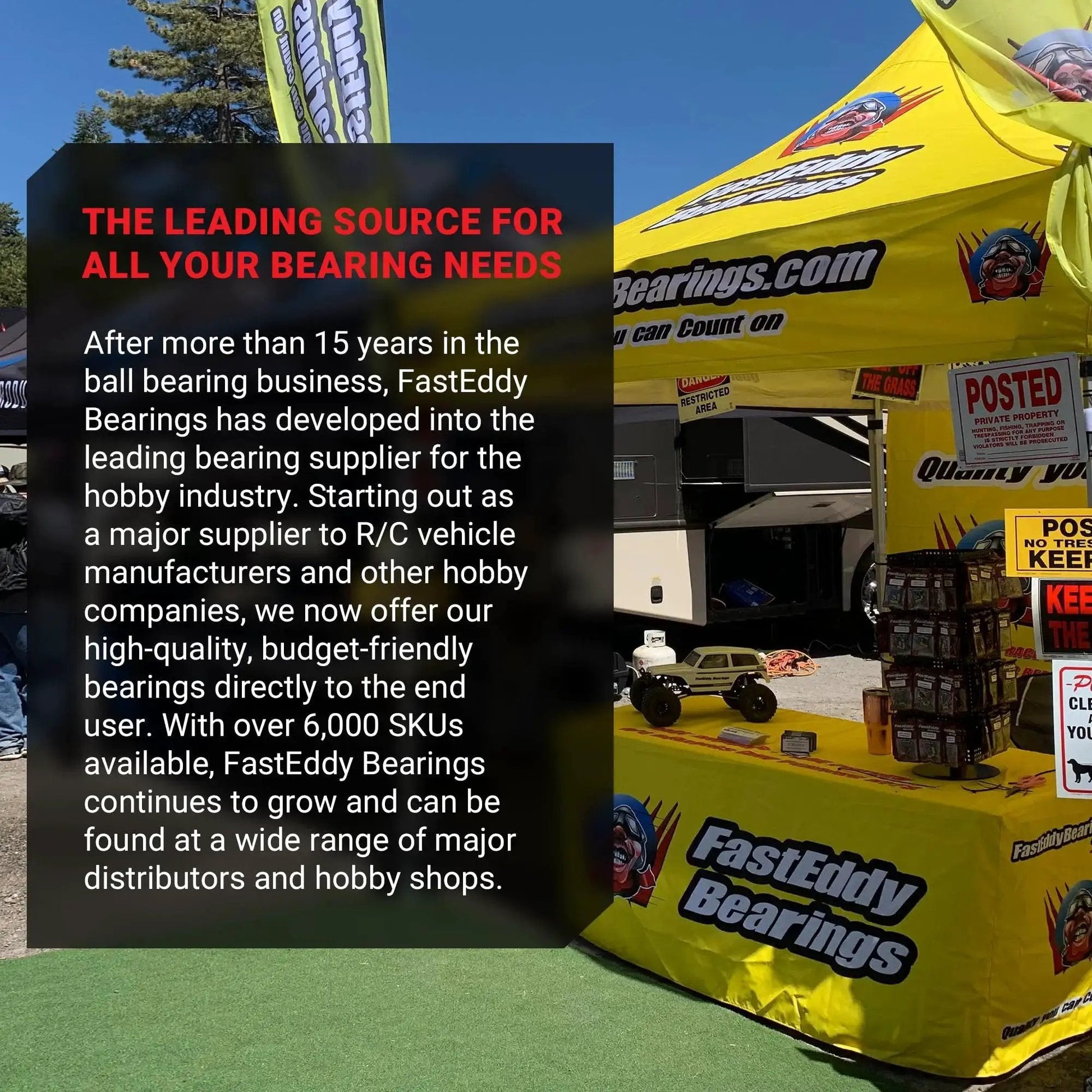 FastEddy Bearings promotional tent display at an outdoor event, featuring product banners and bearing kits.