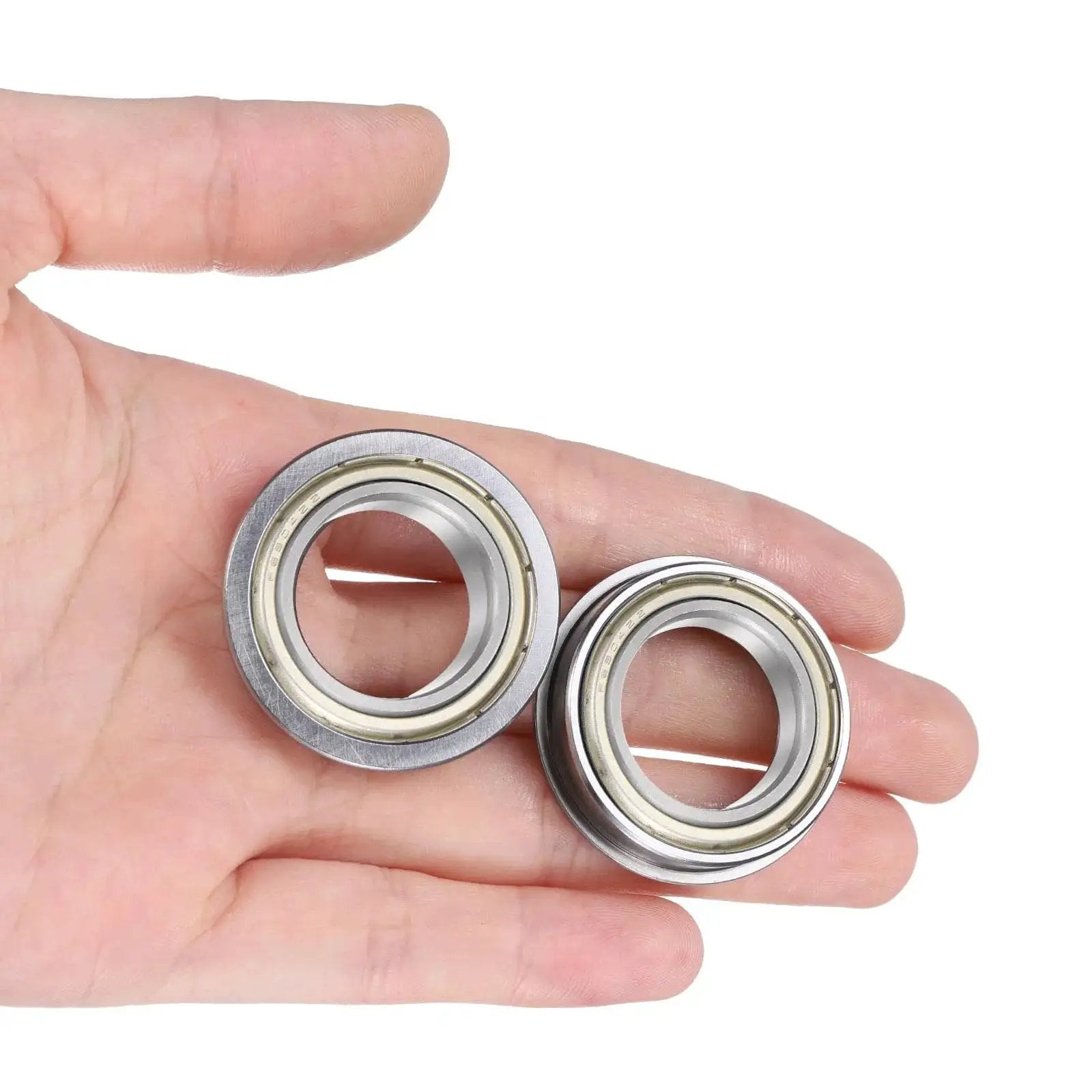 F6804ZZ Flanged Ball Bearing With Double Shielding 20x32x7mm Chrome Steel held in a hand showing size and design