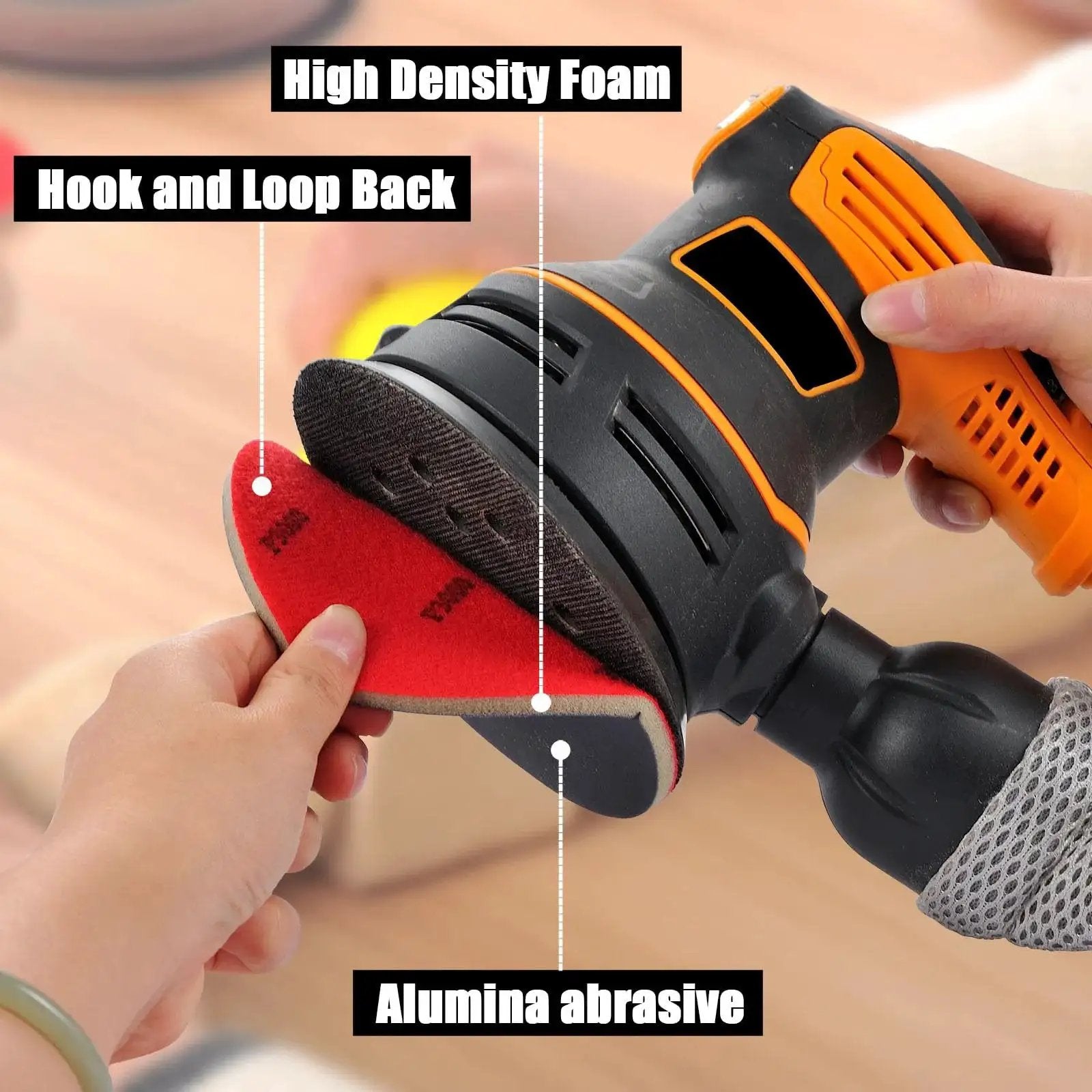 Five Inch Foam Sanding Pad Set 18 Pcs 180 3000 Grit For Wet Dry Orbital Sander being attached to an orbital sander with a hand