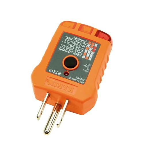 Close-up of GFCI Receptacle Tester from Infrared Thermometer and GFCI Receptacle Tester Kit, showing plug and test indicators.