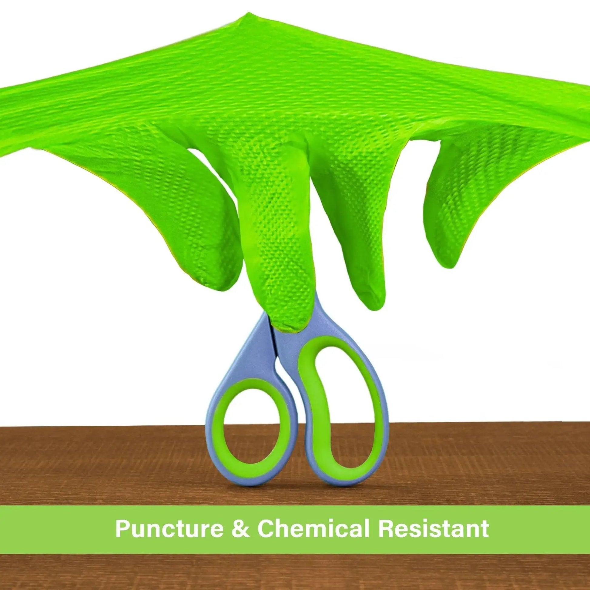 Green Nitrile Gloves Disposable Latex Free 100 Count Large demonstrating puncture resistance with scissors