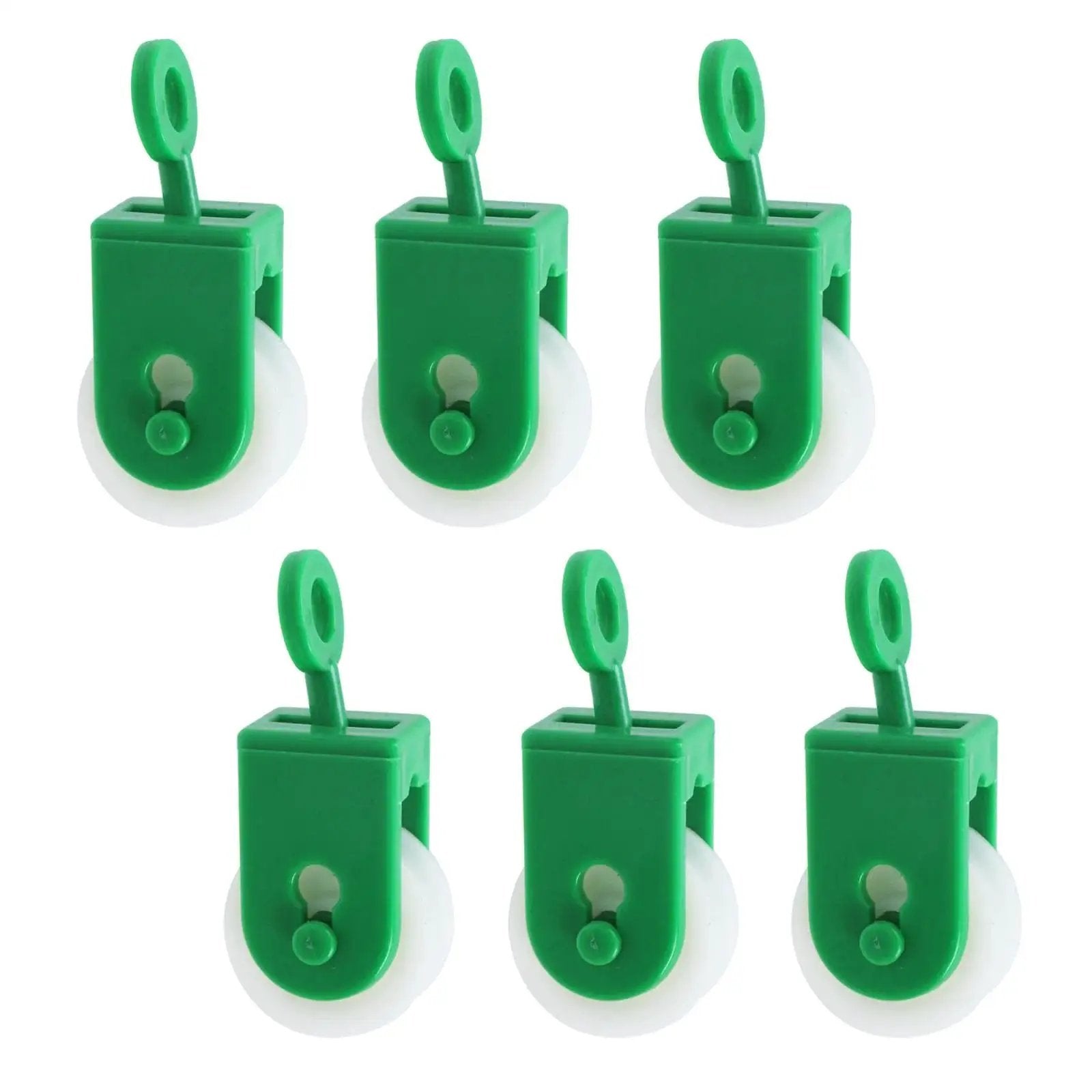 Six green nylon pulleys, one and three eighths inch diameter for outdoor clotheslines and rope pullers, smooth and durable.