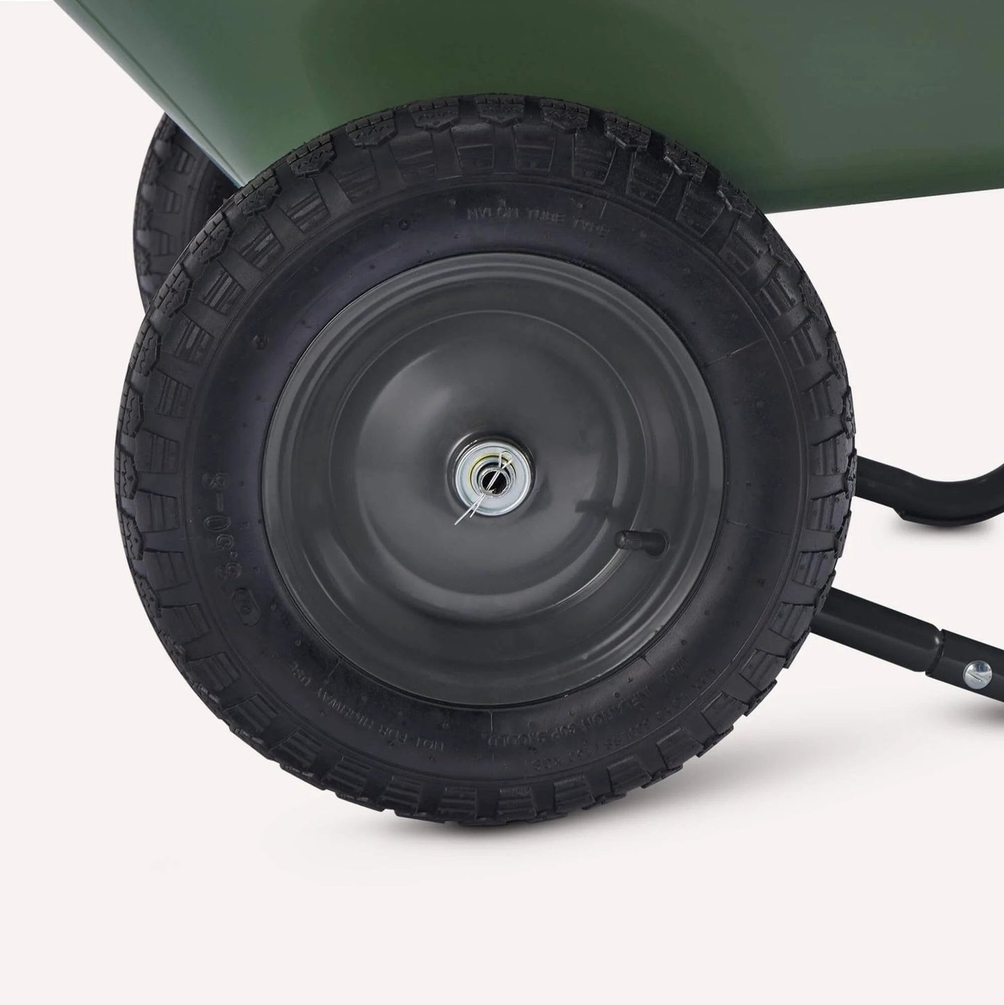 Close-up of inflatable rubber wheel on the 3.7 Cubic Feet Garden Wheelbarrow with 330 Pound Capacity, featuring tread design.