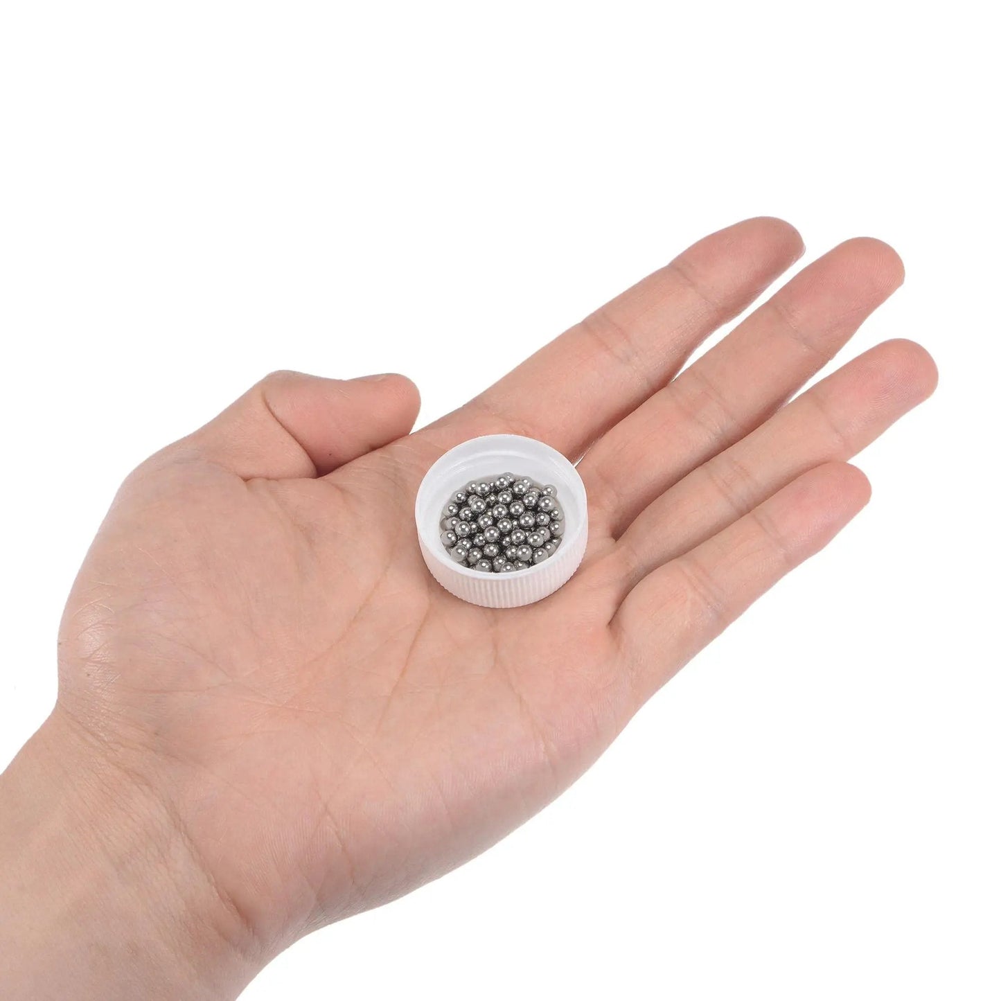 One Eighth Inch Bearing Balls Made From 440C Stainless Steel G25 Precision Grade, Smooth Surface, 100 Pieces, in hand