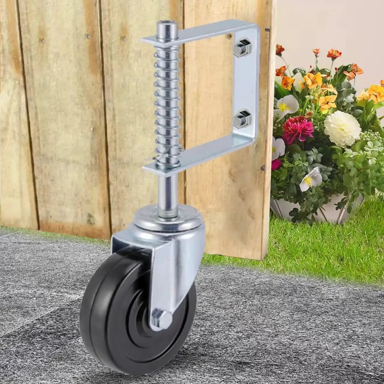 Gate Caster Wheel For 4 Inch And 5 Inch Heavy Duty Spring Loaded Gate Caster With Adjustable Bracket Universal Mount Plate Rubber Wheel 250 To 500 Lbs Load Capacity Suitable For Wooden Gates And Fences Two Pack Or Single Unit on concrete with wooden gate in background.