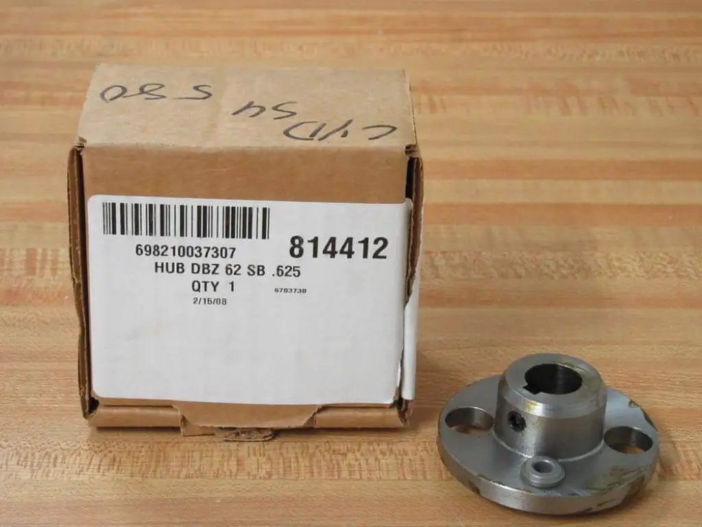 Heavy Duty Hub For Shafts And Conveyors Built To Last With Two And A Half Inch Outer Diameter Five Eighth Inch Bore One Inch Width Ideal For Industrial Power Transmission And Pulleys Model 814412 Rexnord next to its packaging.