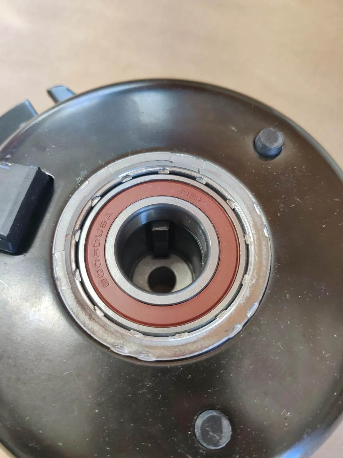Close-up of Replacement for Hustler Electric Clutch For 605827K 5219-193 showing the bearing and mounting components.