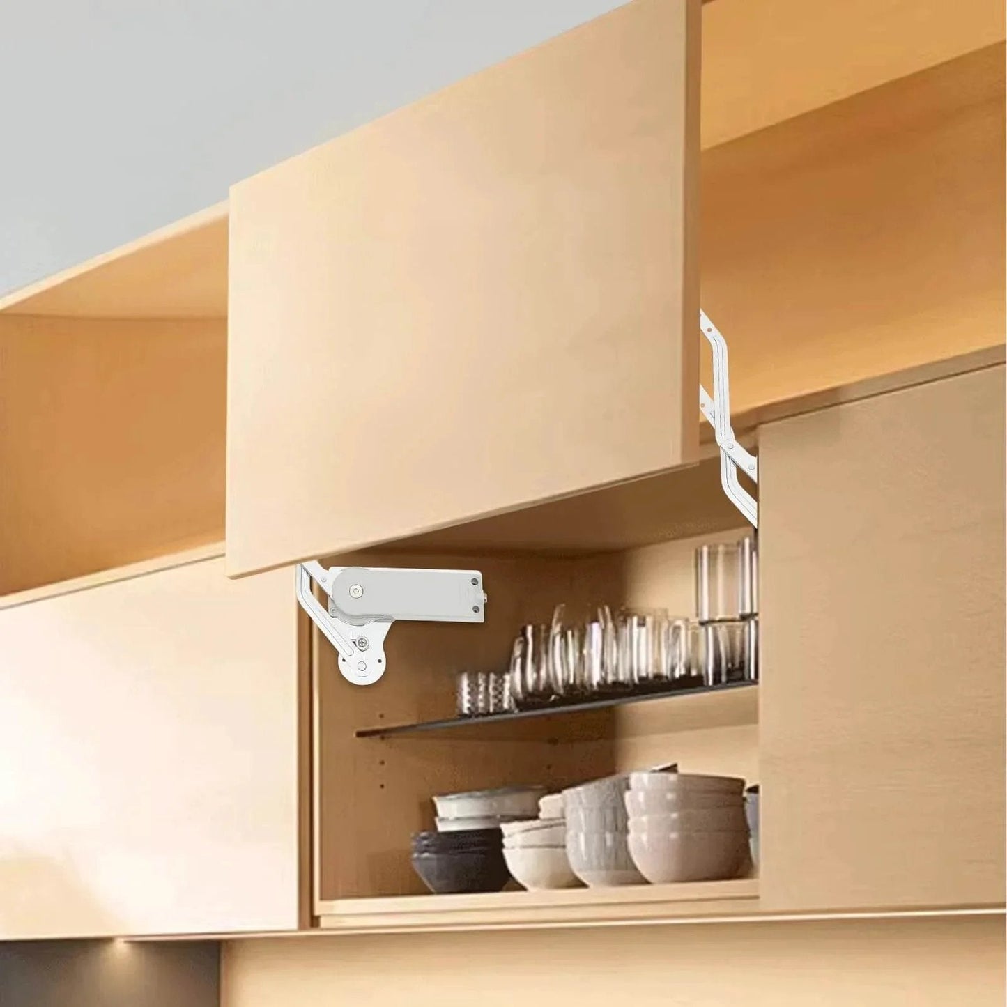 Cabinet Door Hinges, Hydraulic Arm Mechanism Hinges installed in wooden kitchen cabinet with open top-lift door showing pneumatic arm