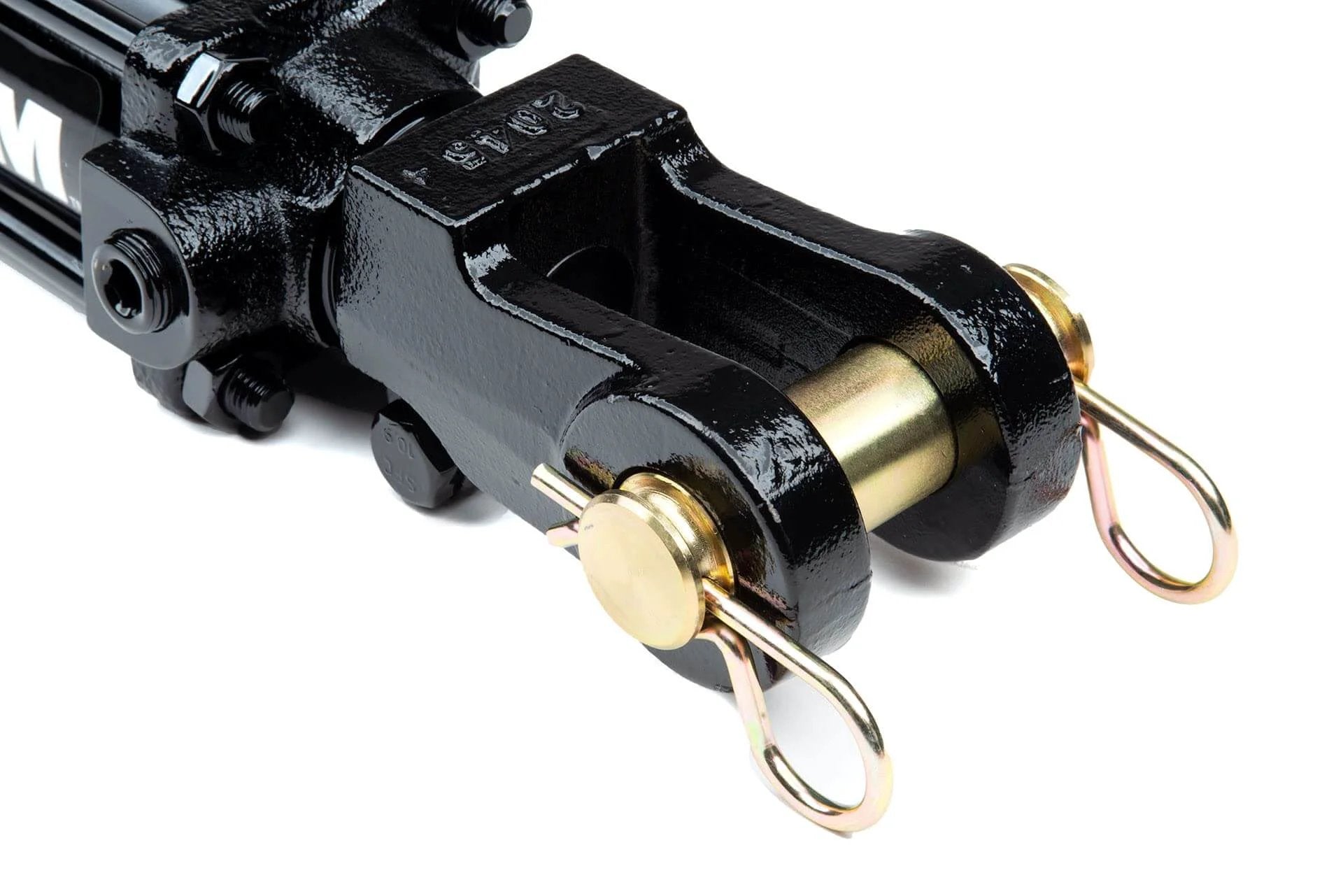 Close-up of hydraulic tie-rod cylinder end with pins, showing durable black finish and metallic components for heavy-duty applications.