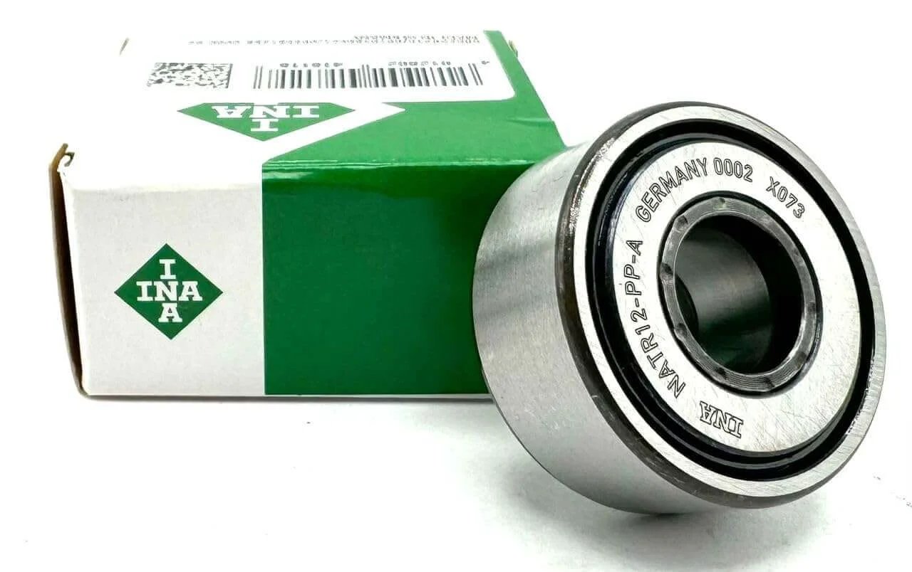 ✝️ INA Germany NATR12 PP Yoke Type Track Roller Bearing 12X32X15 MM with packaging, side view.