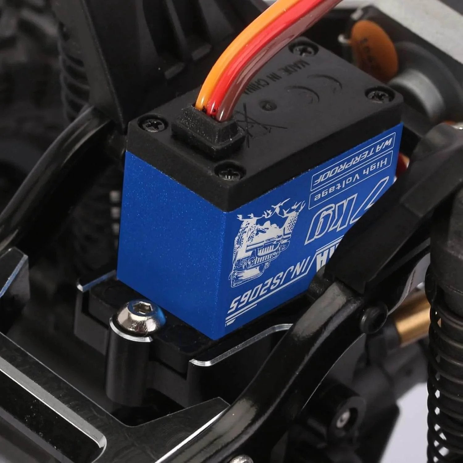 Close-up of 7KG 2065 Digital Servo Waterproof High Voltage Sub-Micro Shift Servo installed in RC crawler car chassis.