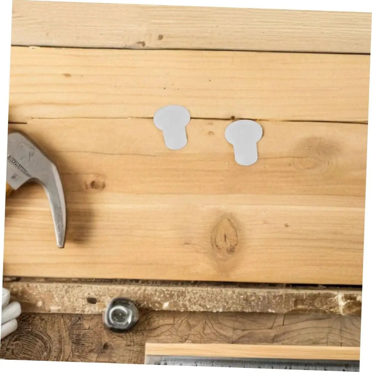 Inline Skate Plastic Bearing Spacers And Side Plugs Kit 50 Pieces on wooden surface with tools