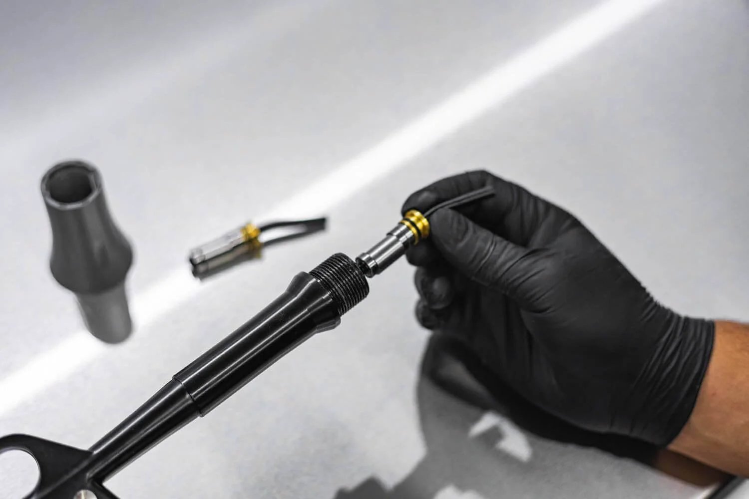 Mechanic installing Ultra Air Blaster Bearing Kit 2 Pack for Version 2; Extend The Service Life of Your Ultra Air Blaster Tools